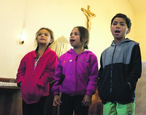 Tamariki sing to the Sisters.