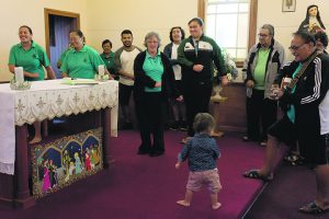 Whānau sing to the Sisters after the Miha.