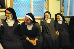 Carmelite sisters enjoying catch up with whānau.