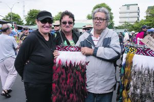 Melissa Paul with Pauline and John Crawford on their visit to Otara Market. 