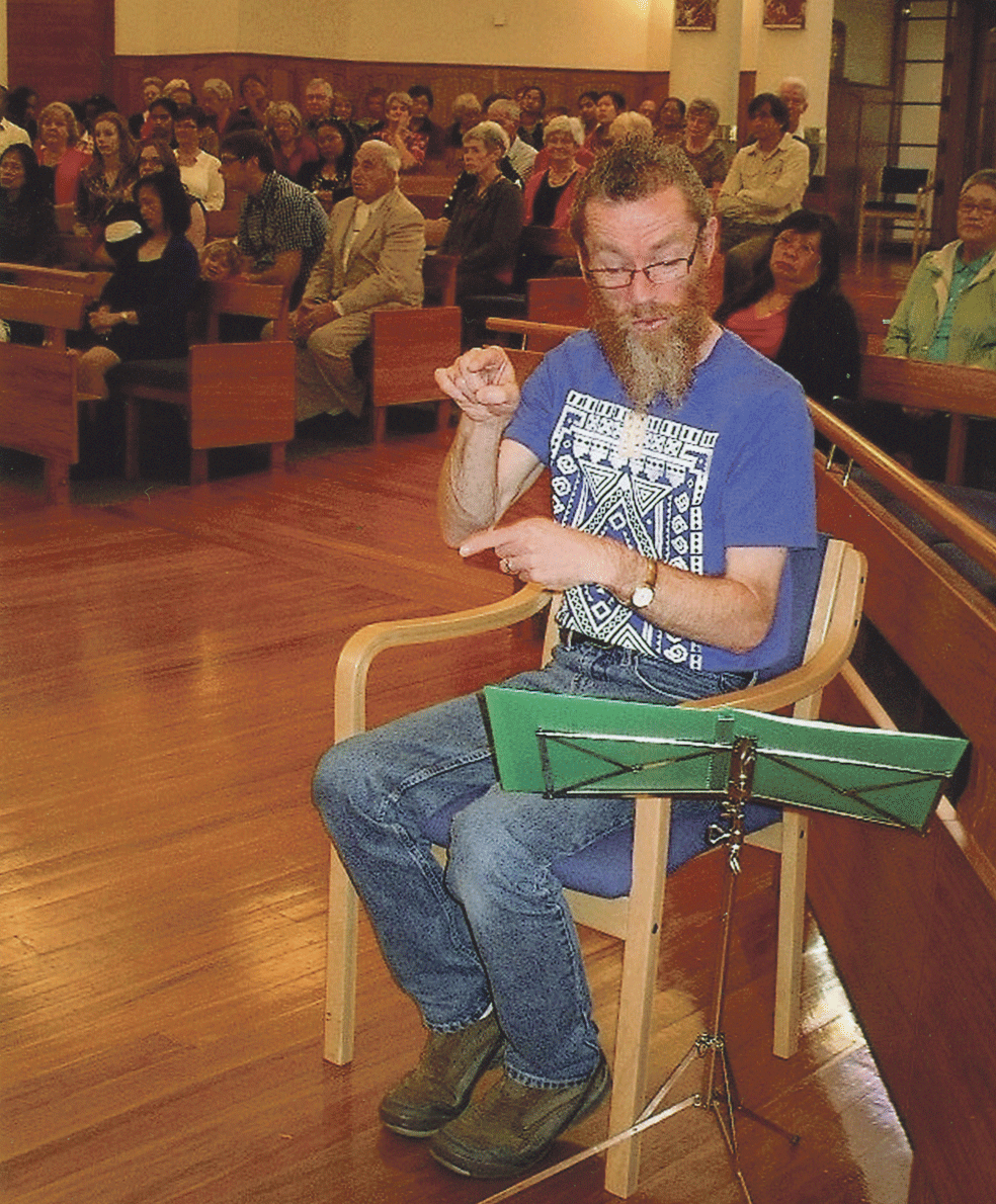 David Loving-Molloy signs Mass for the deaf at Sacred Heart Church, Hastings.