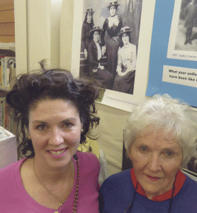 Mary Molloy (left) pictured with her mother Toni (nee Hickman) Molloy in front of a 1897 photo of her grandmother, Mabel Bourke, a St Mary's College student. The Bourke family have a long association with the Catholic Church from early Wellington days and Bourke St in Kilbirnie (where St Catherine's College is situated) is named after them.