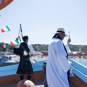 Fr David blesses San Antonino as piper plays. Photo: Annette Scullion.