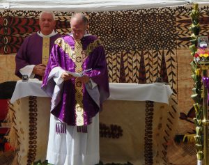 Monsignor Gerry Burns presides at inaugural Mass.