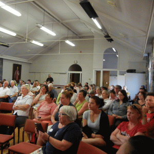 Volunteers at Connolly Hall for a briefing about how to set up houses for refugees.