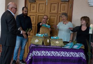 Fr James Lyons blesses A Prayer Companion, with (from left) Taneora Ryall, Caritas; Elizabeth Wootton; Catherine Gibbs, TCI; and Professor Anne Touhy, National Director TCI. Photo: Annette Scullion