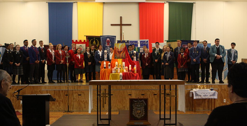 O’Shea teams assemble at the start of Sunday Mass presided by Bishop Charles Drennan.