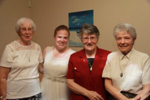 Karen Lea Englebretsen, in formation with the Passionist Sisters in Melbourne is pictured (second from left) with Srs Joan Smith, Brigid Murphy, and Anne Cunningham.