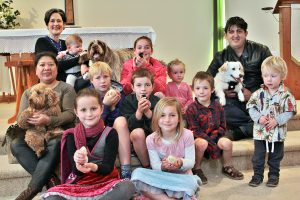 Parishioners and their pets gather at St Francis of Assisi Sunday.