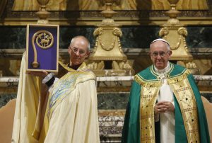 Anglican Archbishop Justin Welby of Canterbury, England, spiritual leader of the Anglican Communion, holds a replica of the staff of St Gregory the Great given by Pope Francis at a vespers service at the Church of St Gregory in Rome, 5 October. Photo: CNS/Paul Haring.